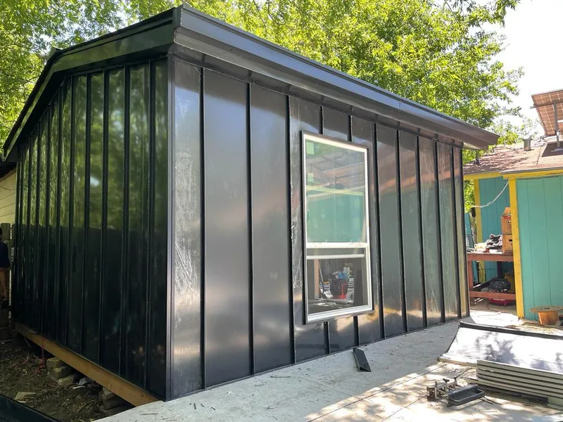 Black standing seam metal wall panels for Roof Inspection in Frankfort